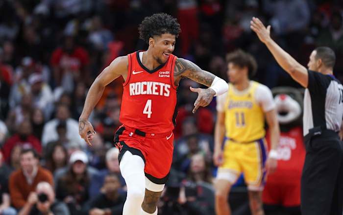 Rockets guard Jalen Green celebrates after scoring a basket during the third quarter against the Los Angeles Lakers at Toyota Center.